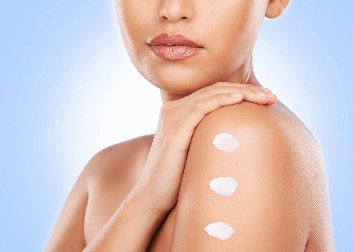 beautiful woman posing with moisturized shoulder